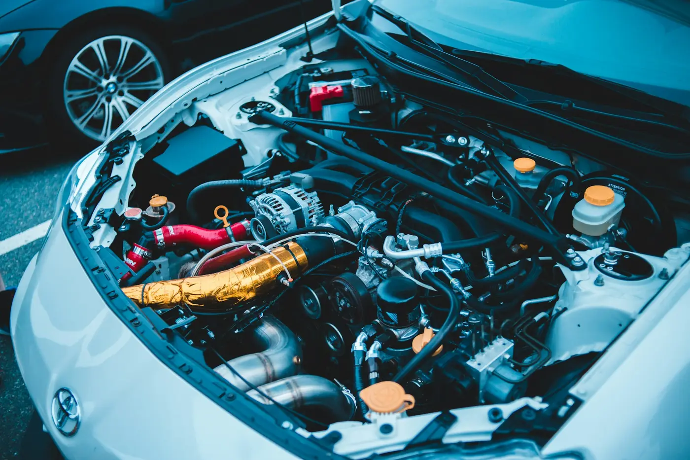 Engine bay with the intake plumbing exposed